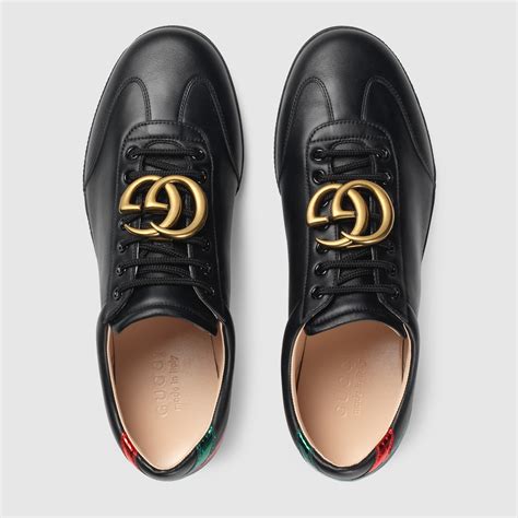 gucci shoes website.